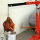 Illustration for article titled How To Deep Fry A Turkey With An Engine Hoist